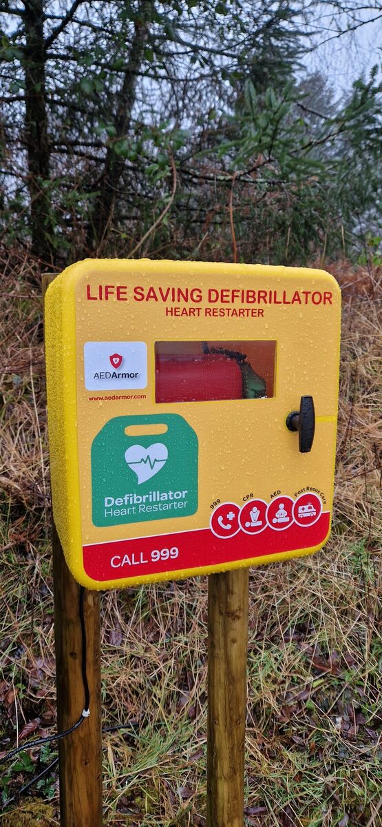 Charity buys defibrillator for town