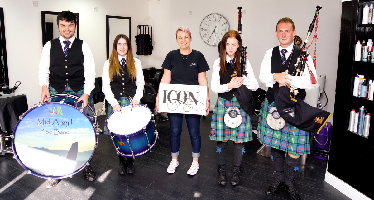 Pipe band travels to worlds in (hair)style