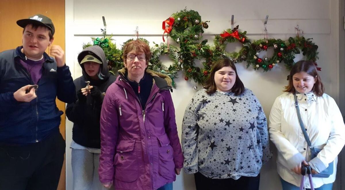 Merry makers sell wreaths at festive fair