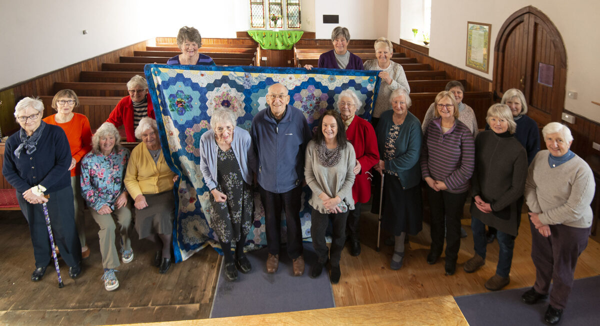 Quilt, 36 years in the making, finds its home and inspires new friendships