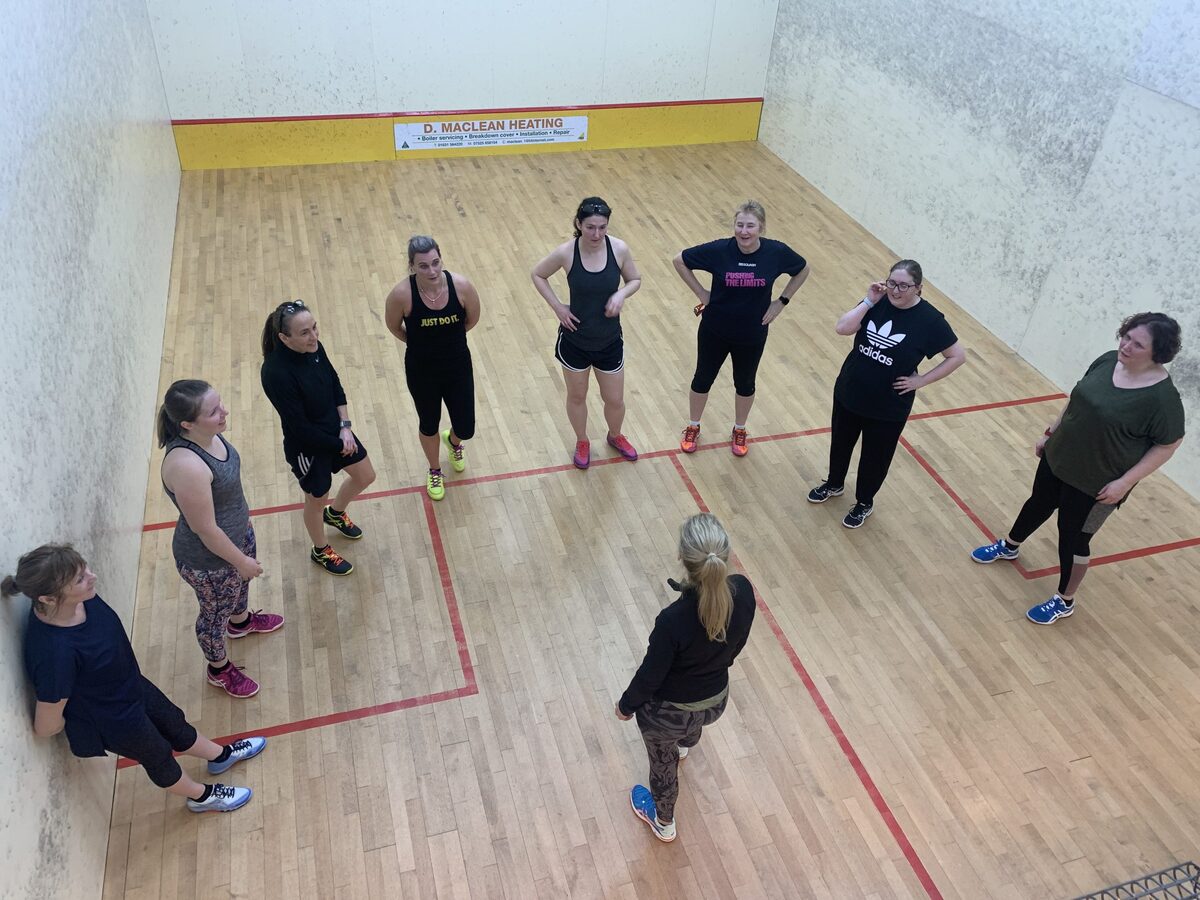 Lisa delivers coaching sessions to Squash Club