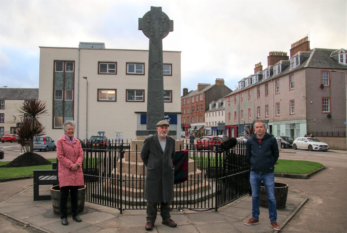 Town's iconic cross restored to former glory