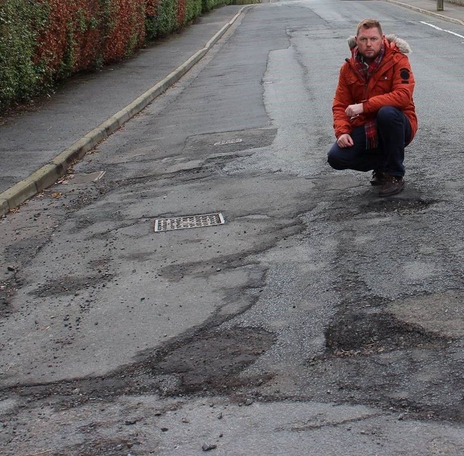 Drivers urged to report potholes