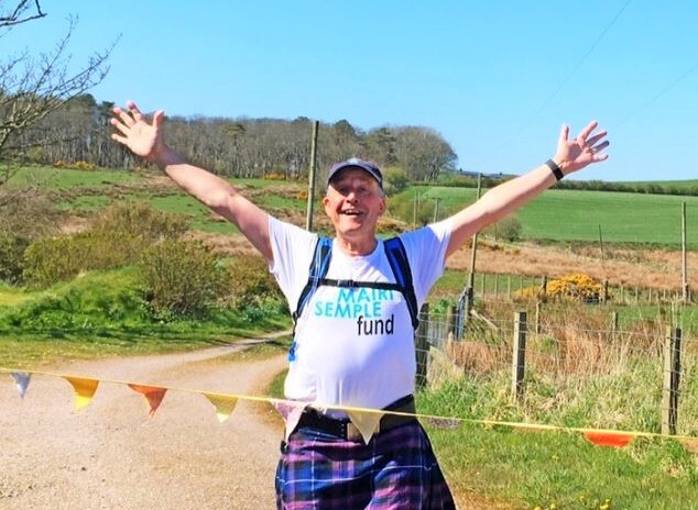 Kiltwalkers cross paths during charity challenges