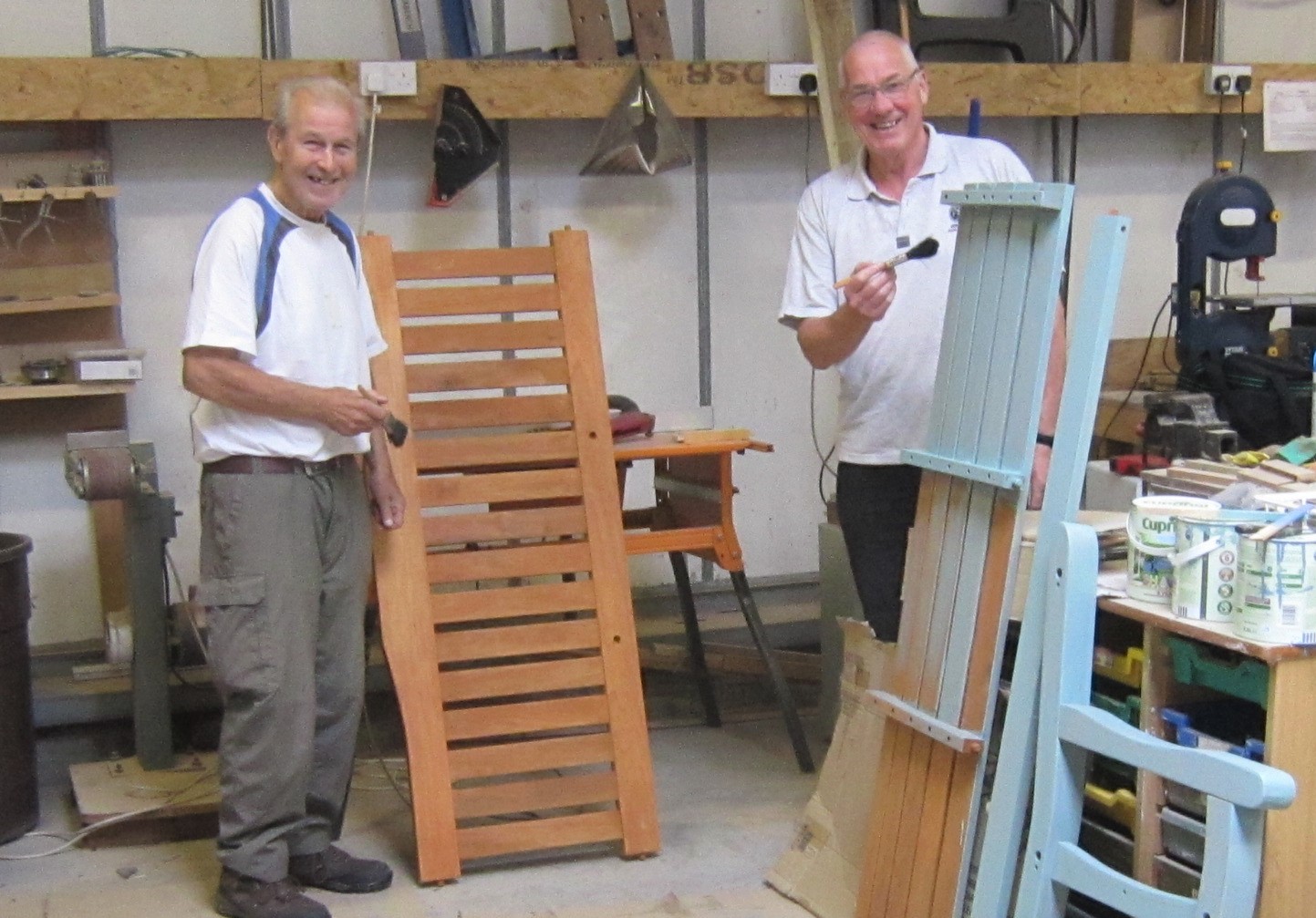 Volunteer medals for West Coast shed, paper and garden