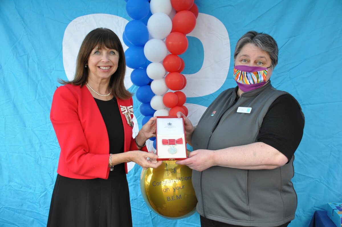 Community turns out to congratulate Liz receiving her BEM