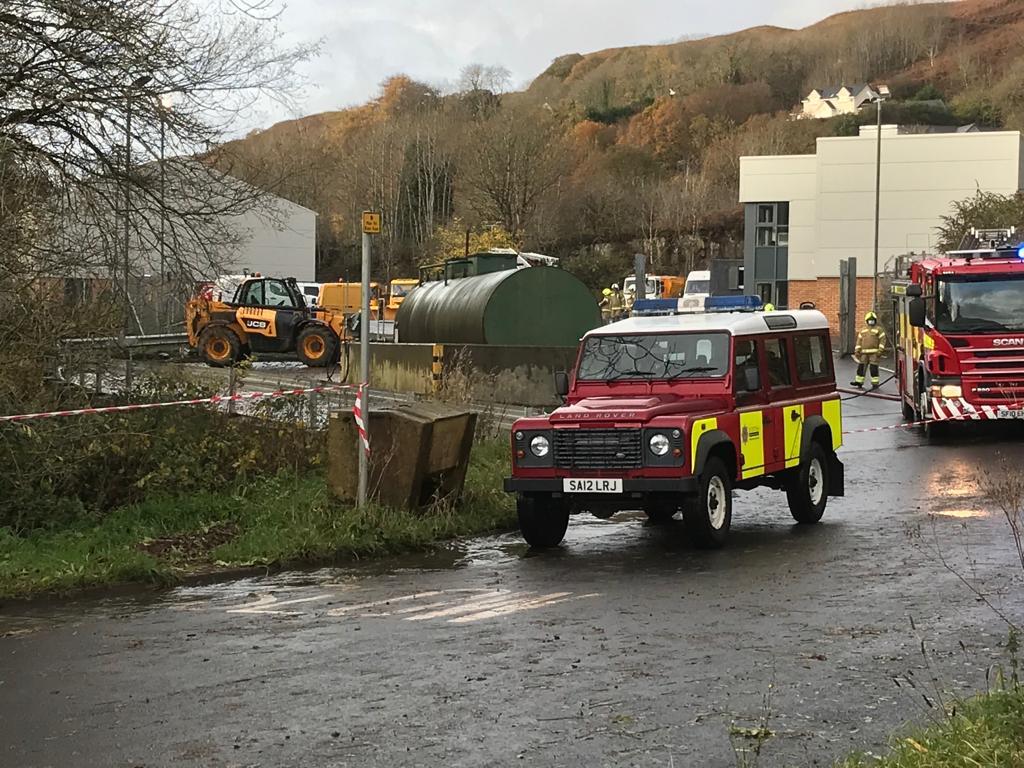 Homes evacuated and trains cancelled after flames at council depot