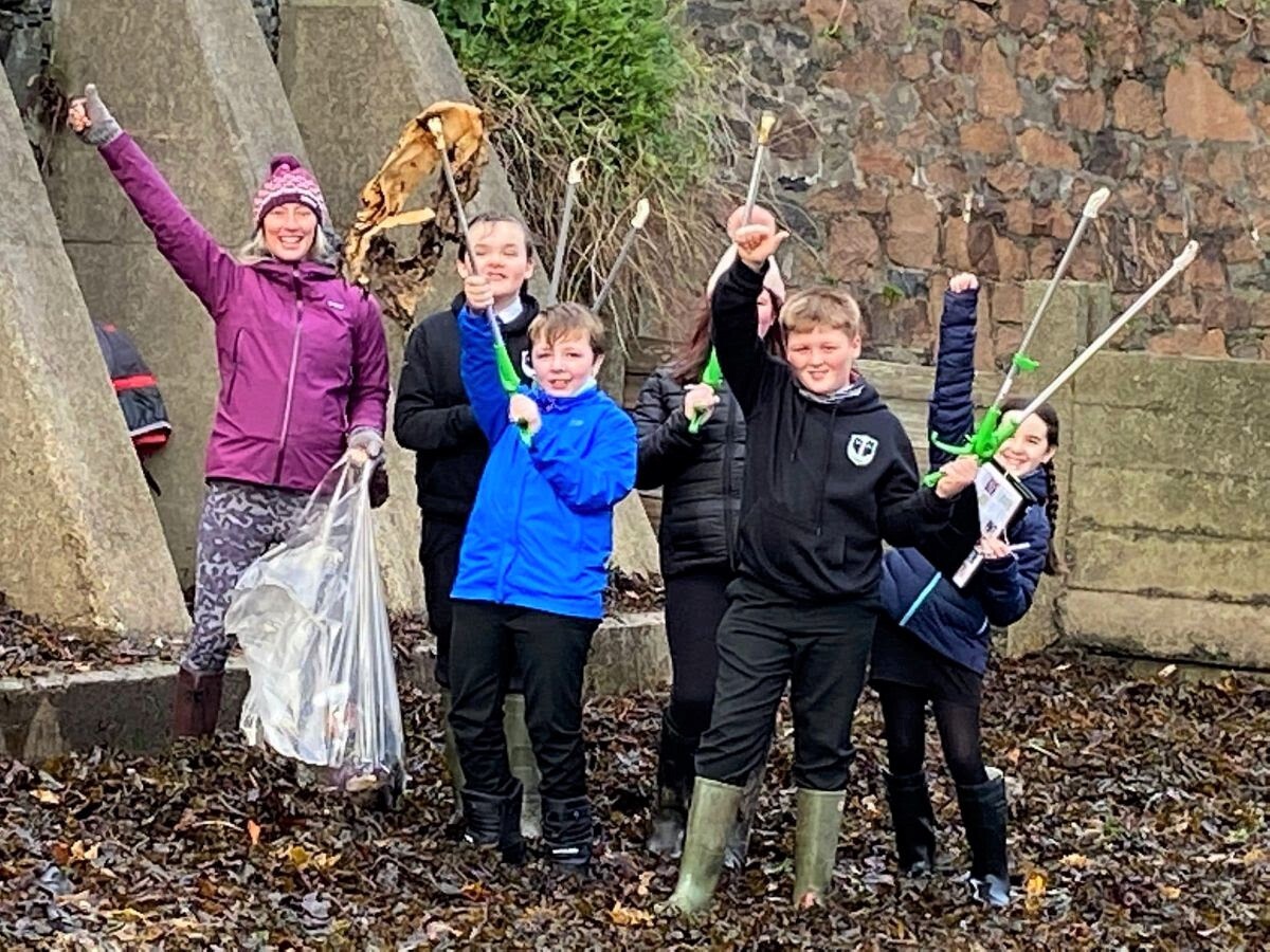Pupils help clean up town beaches
