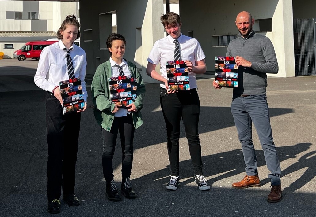 Recruitment firm steps in to help high school yearbook project