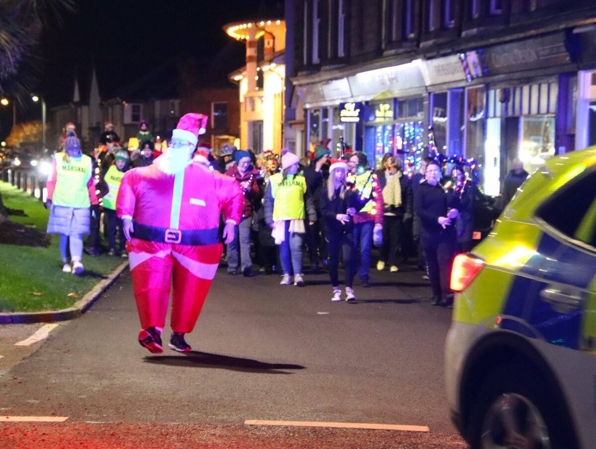 Cancer charity lights up town with festive walk