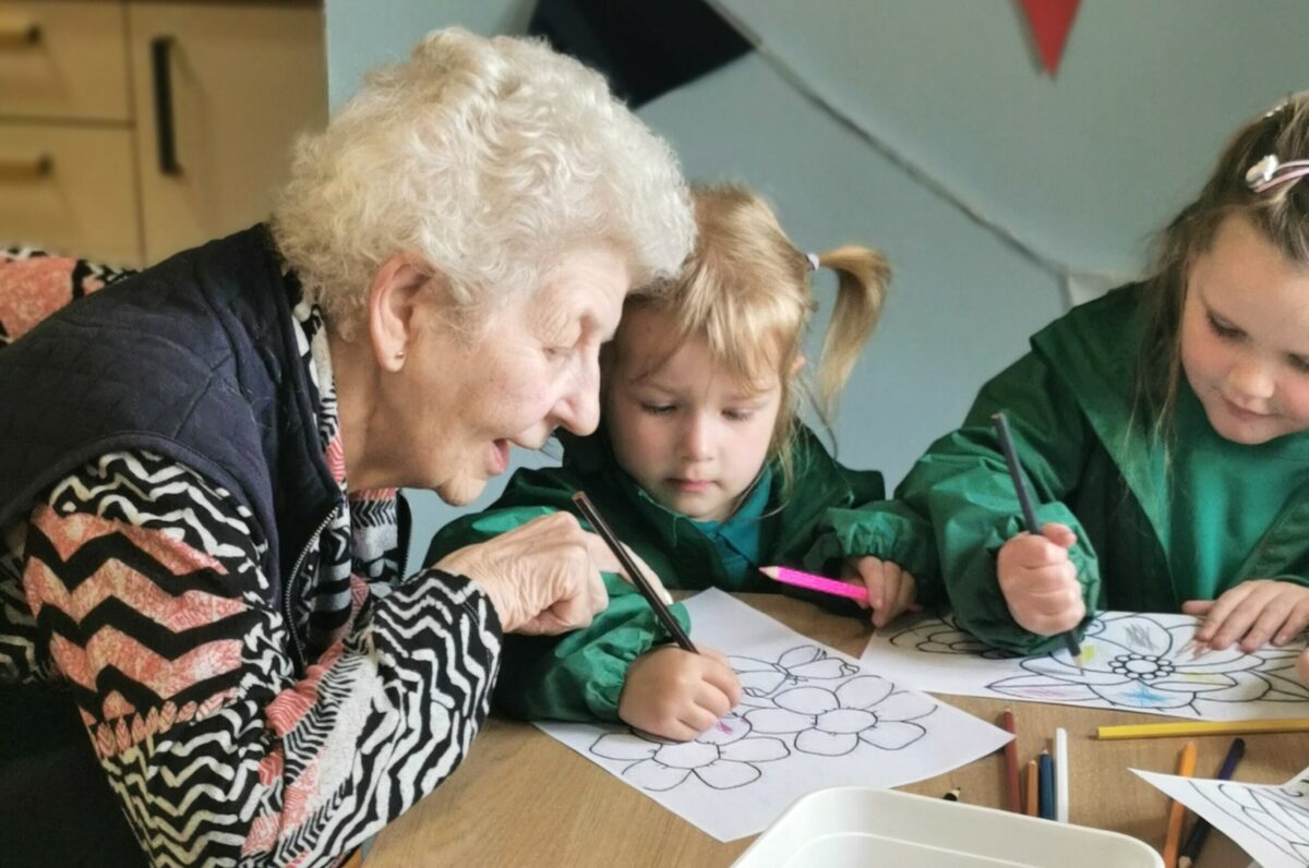 Intergenerational bonds blossom during nursery visit to care home