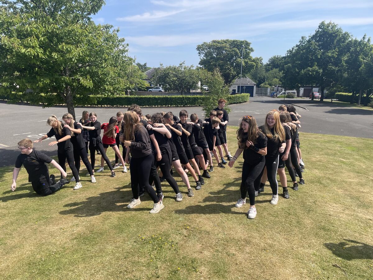 Pupils take the classroom outside to enjoy fun in the sun