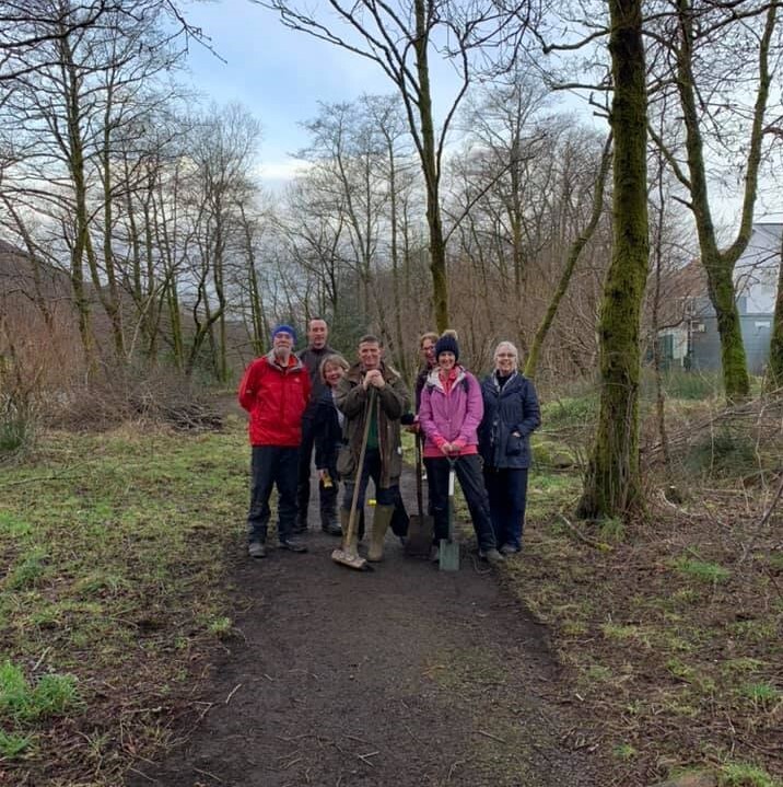 Volunteers reveal the full riverside path after clear up