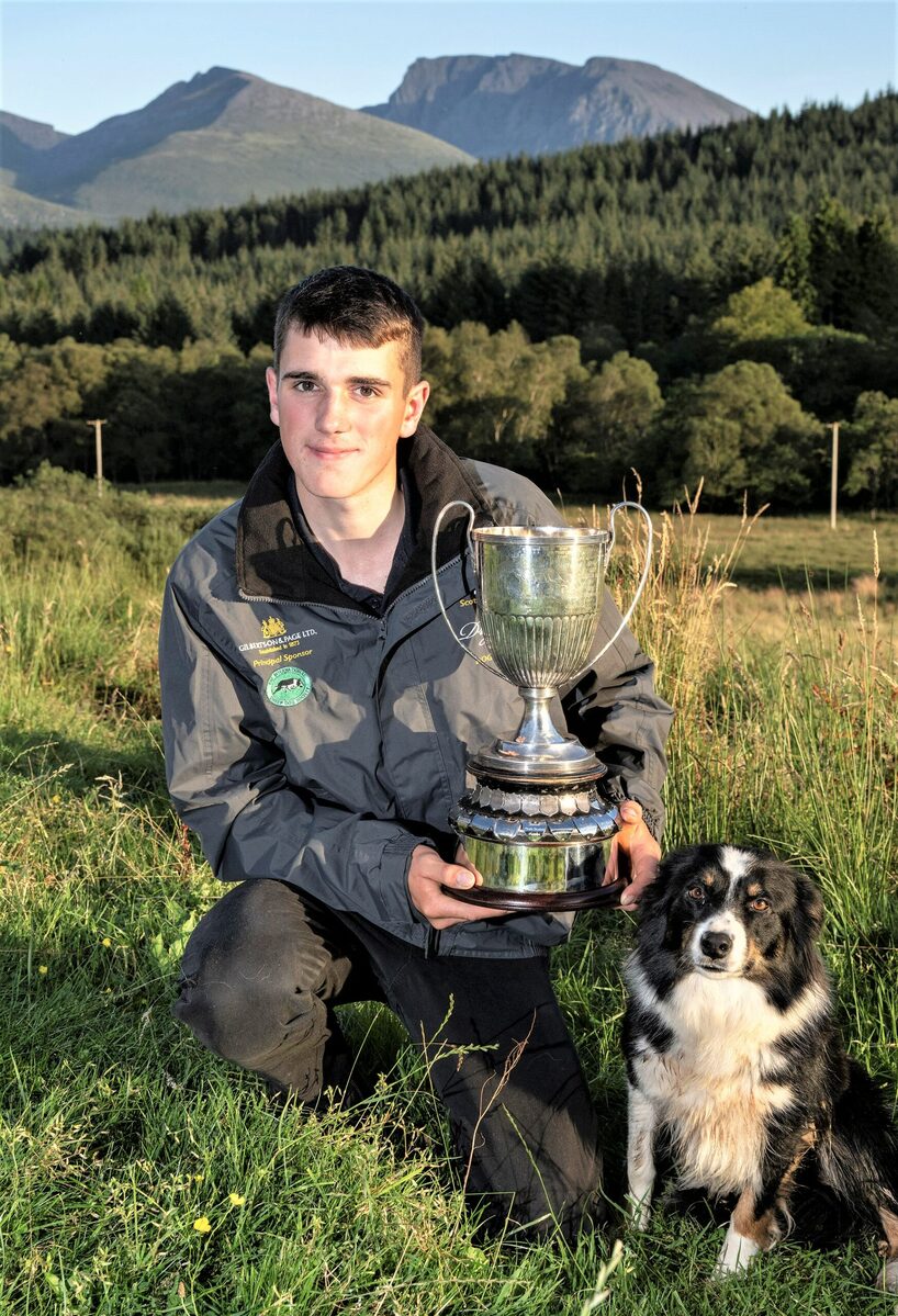 Freddy receives his trophy just in time to return it!