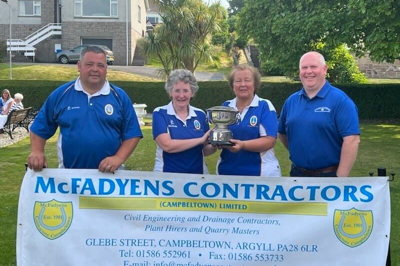 Shirley and Shona lift bowls trophy
