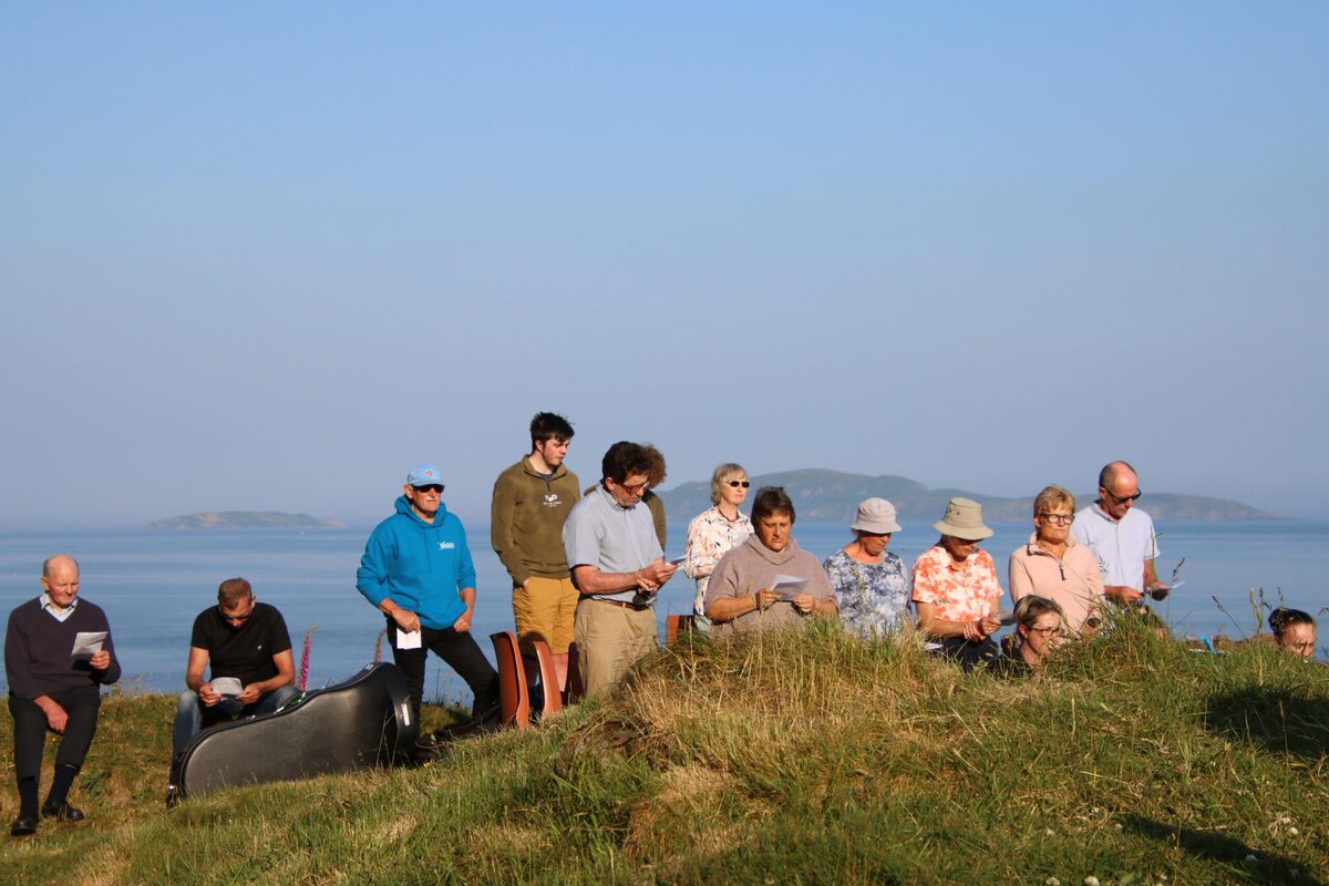 Sun banishes midges from St Columba's Conventicle