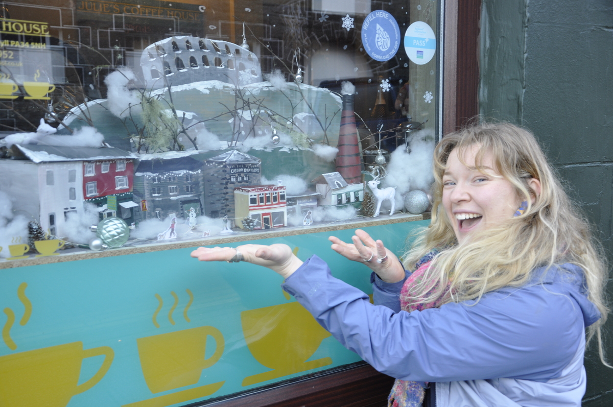 Lisa Gutcher with her mini Oban design that won best dressed window for Julie's Coffee House as part of this year's Winter Festival.