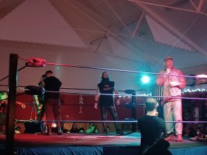 Posters torn down for community-organised wrestling event