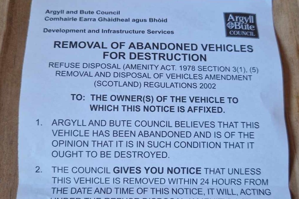 The council notice affixed to the car parked outside the home of a Taynuilt resident.