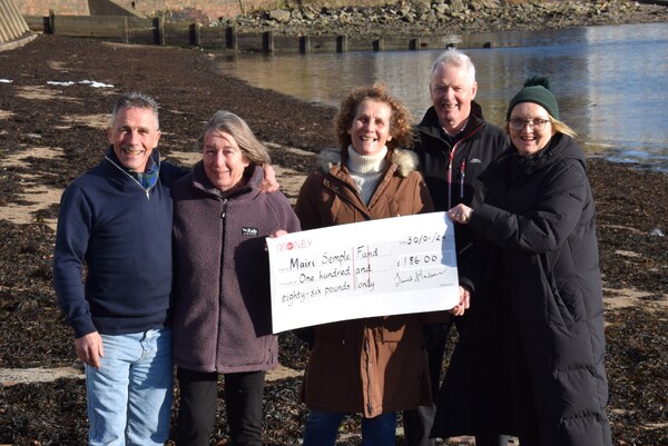 Dip For Dosh donation to Kintyre cancer charity