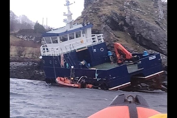 RNLI go to rescue three souls on grounded workboat
