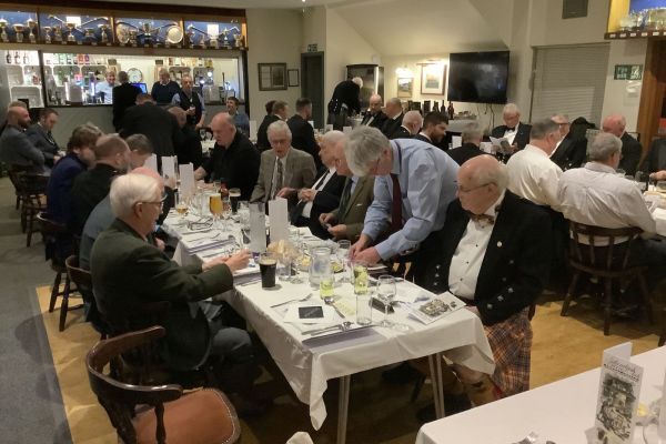 Well-versed Burns Club members plough through challenges to host supper