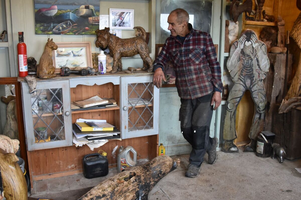 Sculptor Marvin Elliott with Clyde and some of his other sculptures in his workshop at Corrie.