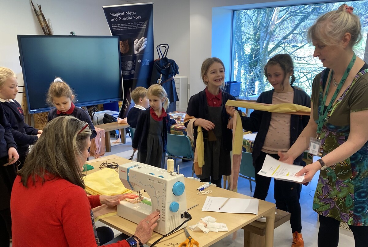 Children from Rhunahaorine Primary School working on their costumes in the new Kilmartin Museum education base.