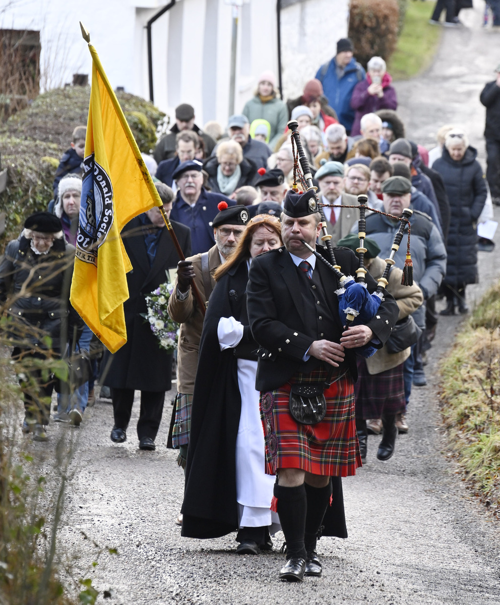 Piper Brian Herriot leads the parade to the Massacre of Glencoe monument. Photograph: Iain Ferguson, alba.photos.