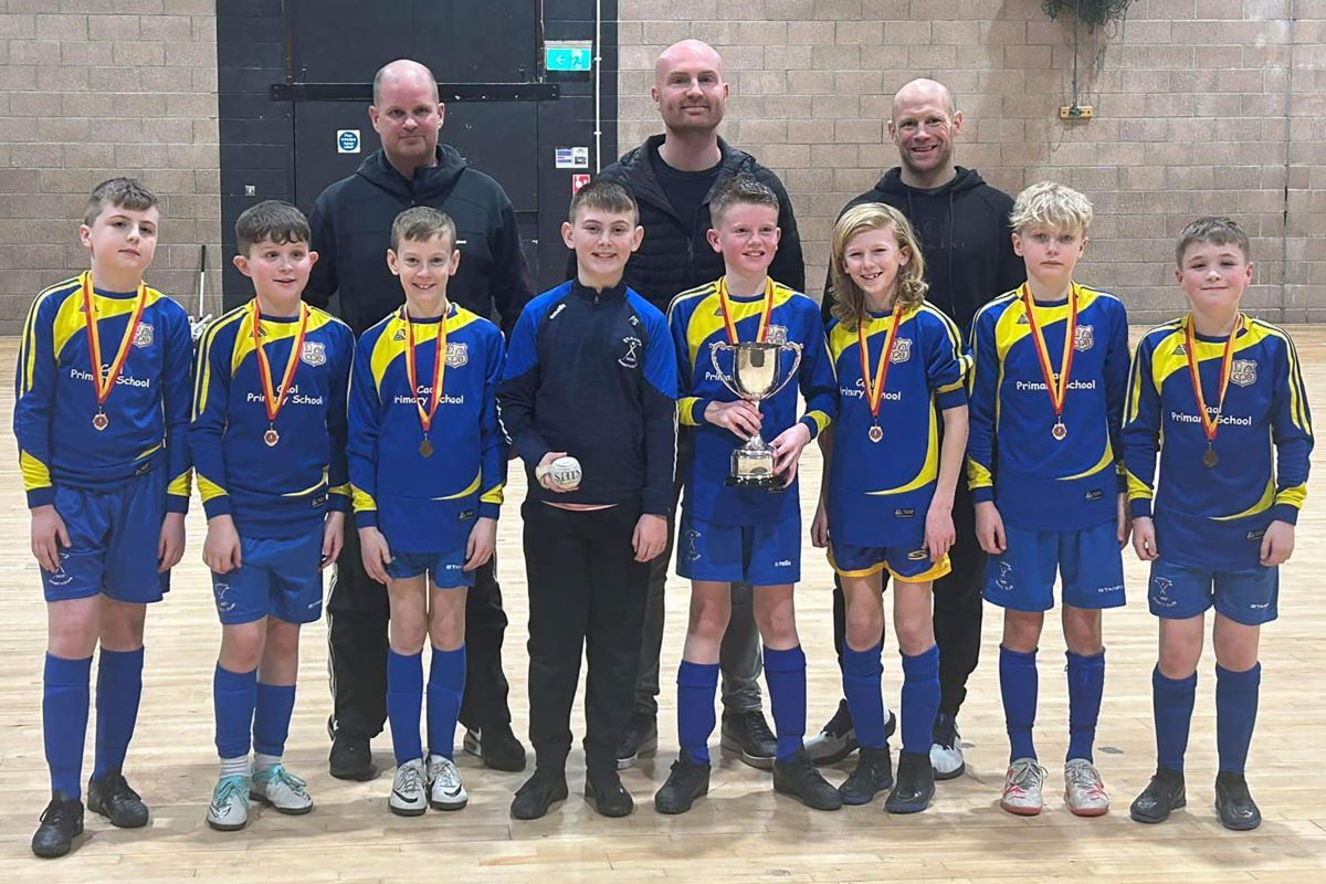 Winners of the P6/7 section of the National Shinty Finals, Caol Primary School.