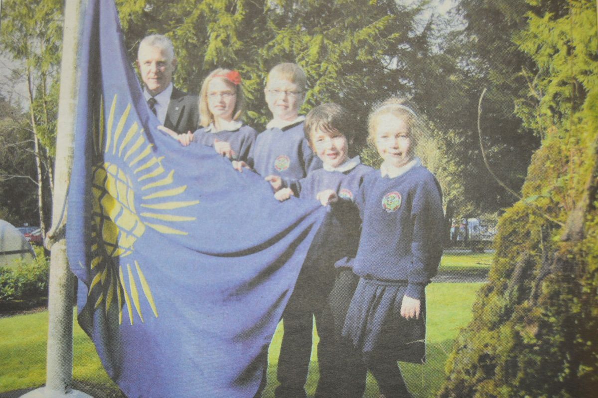 2014: Lochgilphead Primary School pupils Ailsa Wilson, Connor Rennie, Andrew Ritchie and Rowan MacDonald, helped Douglas Philand, depute provost of Argyll and Bute, raise the Commonwealth flag at Kilmory Castle.