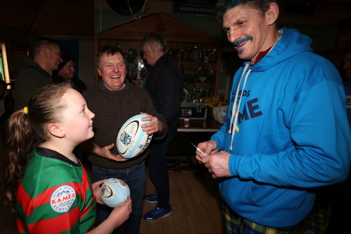 Rob Wainwright with Andy Bevis and his daughter Ella having a laugh at Oban Lorne RFC open day.