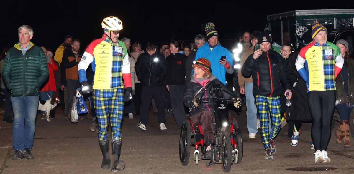 The Doddie challenge team get a good send off from Luing. Rob Wainwright chats on the ferry slipway with Tooti Cadzow before crossing the Cuan Sound to Seil ready for the first leg of the epic cycle challenge. Photograph: Kevin McGlynn.