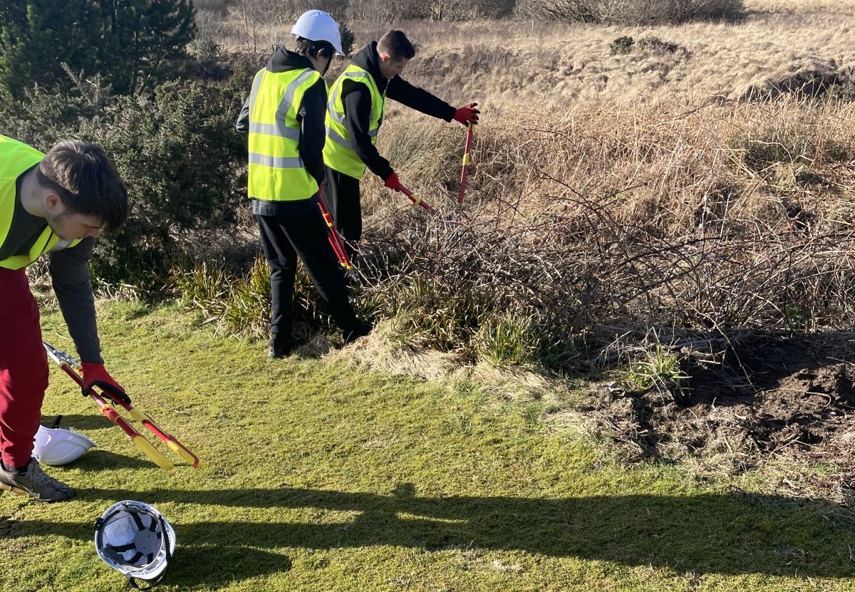 The group has been helping to tidy overhanging branches, seeding and repairing divots. Photograph: Mid Argyll Youth Development Services.