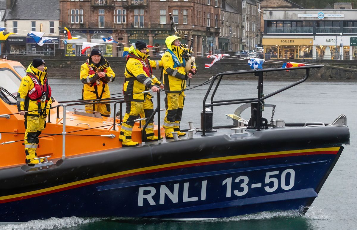 The crew who brought The Campbell-Watson to Oban were joined by piper Kate MacPherson. Photograph: Stephen Lawson. The crew who brought The Campbell-Watson to Oban were joined by piper Kate MacPherson. Photograph: Stephen Lawson.