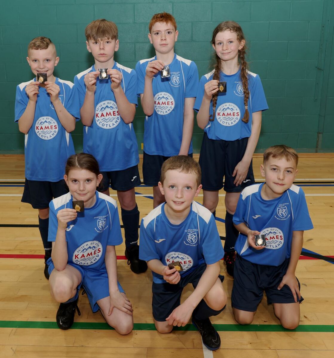 Senior section winners Rockfield with their medals. Photograph: Kevin McGlynn. 