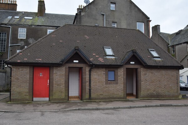 Council backs away from running toilets