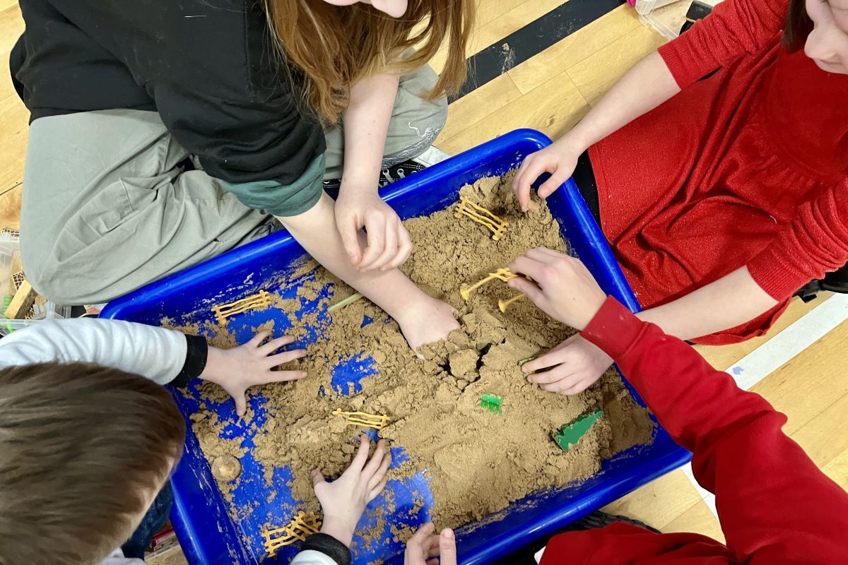 Primary school pupils demonstrated what they wanted for the future of the village using sand trays.