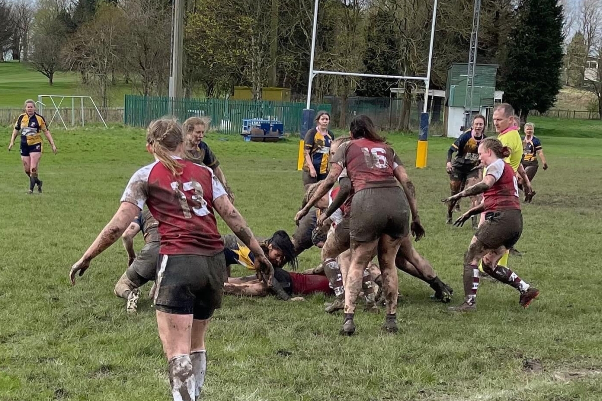Despite the mud bath Mid Argyll/Waysiders Drumpellier and Swedish Lugi Lions get stuck in to the game: Photograph: Mid Argyll RFC