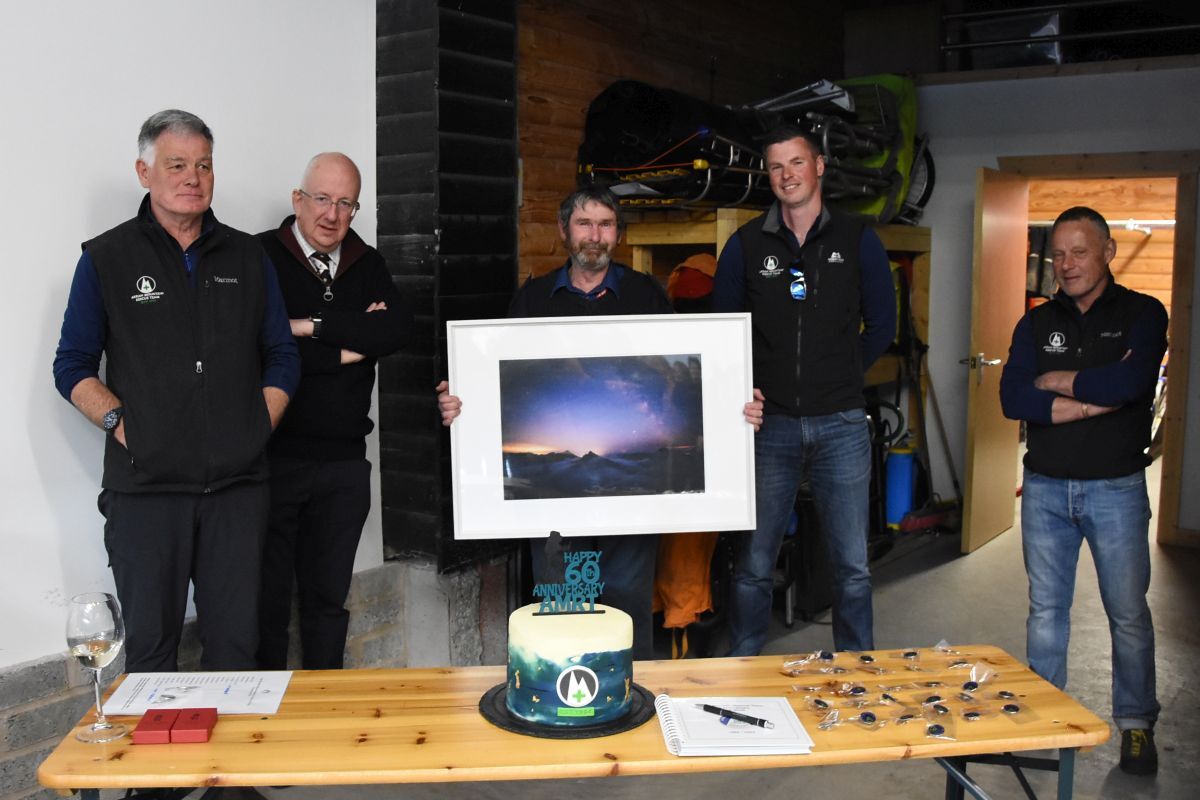 AMRTs secretary Robert Waine, Doctor Roddy Neilson of St John Scotland and AMRT leader Ewan McKinnon with AMRT chairman Alistair Hume, present Jake Kerr with a gift for his 42 years of service prior to his retiral.