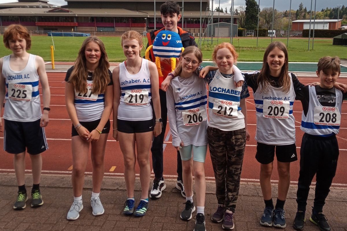 From left: David Rodgers, Erin Starkey, Lia Marsh, Elsie Lees, Carys Rodgers, Caoimh Bellshaw and Toby Smith. Back row: Angus Davies with mascot Speedy.