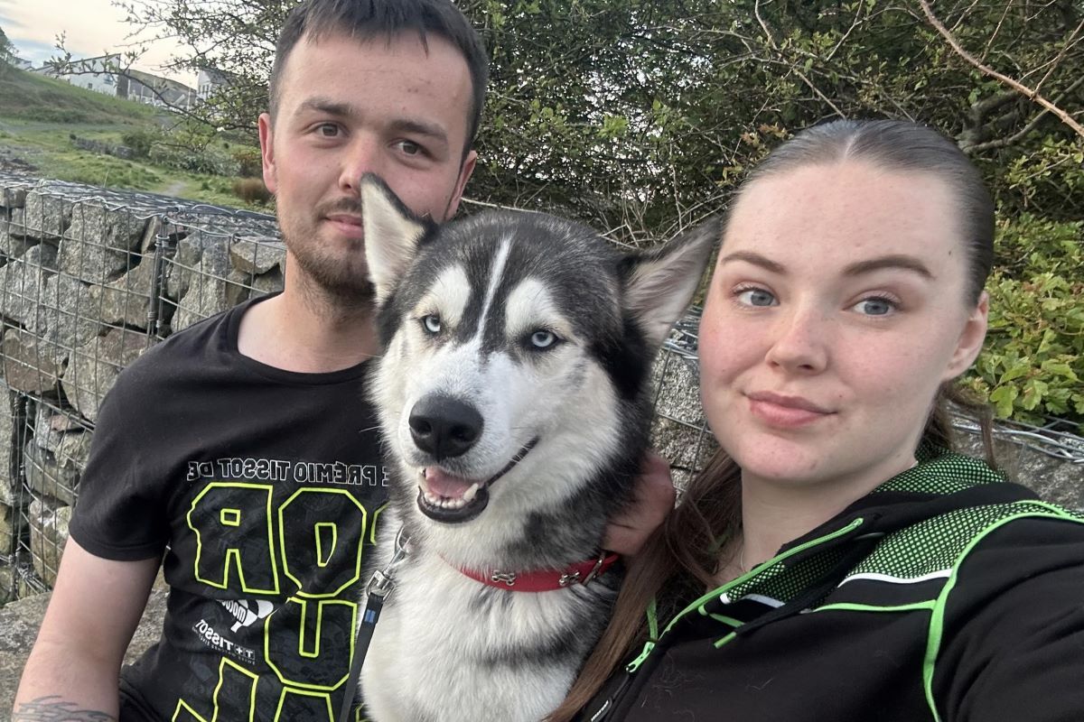 Chloe Smith and Liam Guild with the latest member of their family - Shadow.