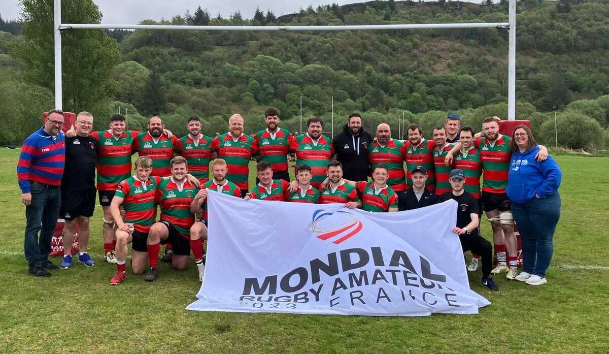 Marion Jouveau and Arnaud Sean Thornton from Mondial Rugby Amateur visited this week and brought the flag from Rugby Club Dignois. Photograph: Oban Lorne RFC.