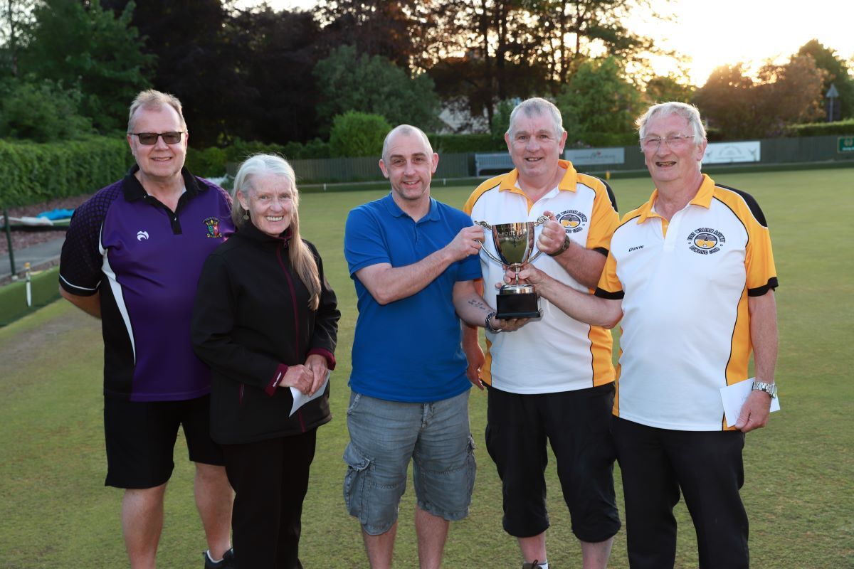 Kelly Master of Fort William Lodge 43, centre, who made the presentation to the winners Maurice Wells, second right, and David Weir with runners-up Barbara Gear and Alan Ogilvie. Photograph: Anthony MacMillan Photography