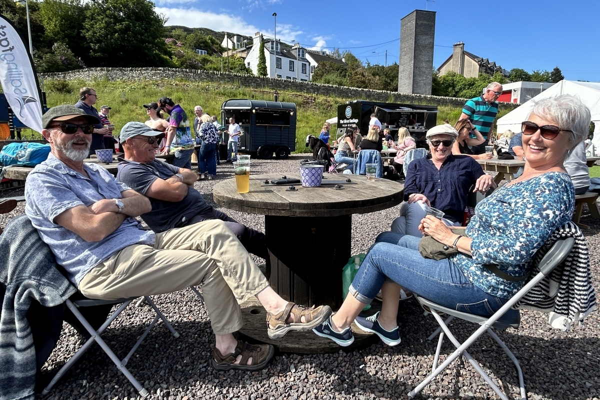 All smiles in the sunshine at Tarbert Harbour during the Jura Scottish Series. Photograph: Pure West Media