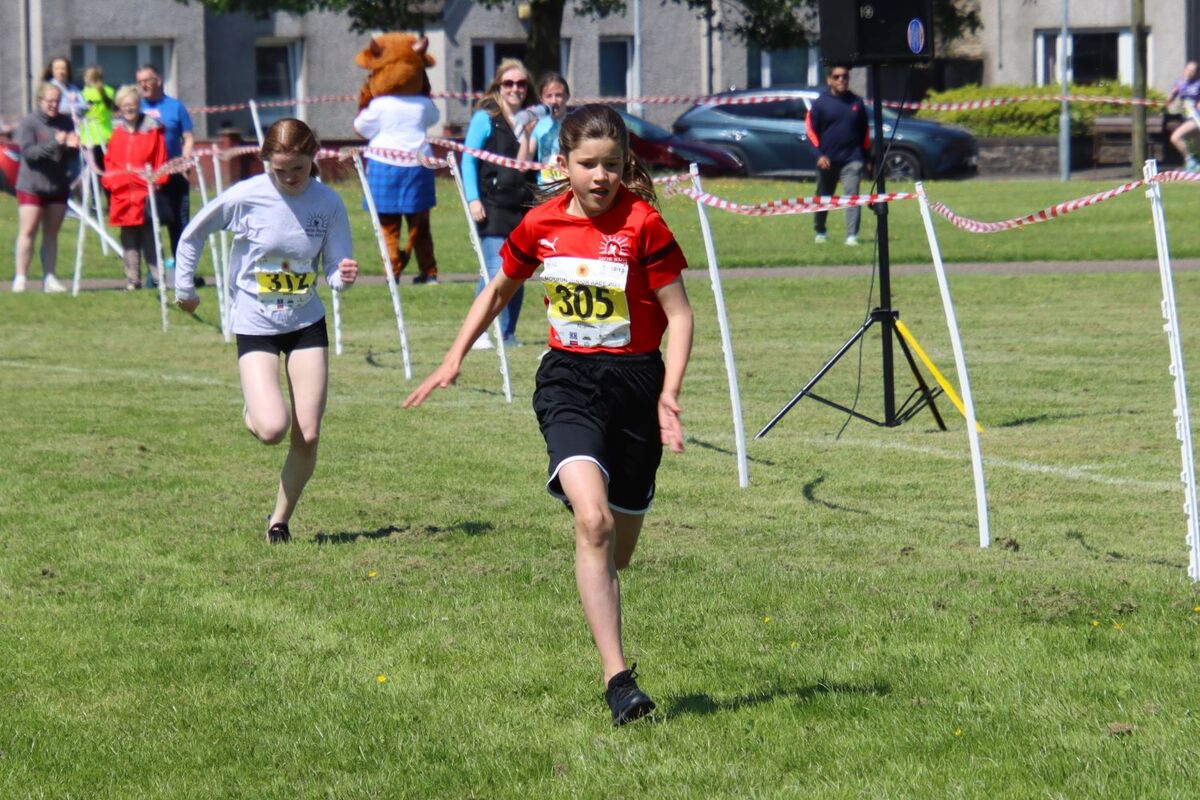 Girls’ 11-12 course record-breaker Niamh McSporran nearing the finish line. Photograph: Kenny Craig.