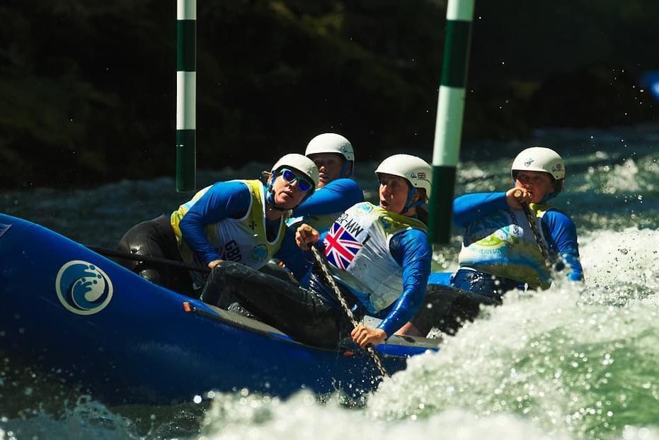 Kerrera's Gill Vollum, at the back of the raft on the right, won gold in the Rafting World Championships as part of a GB team.