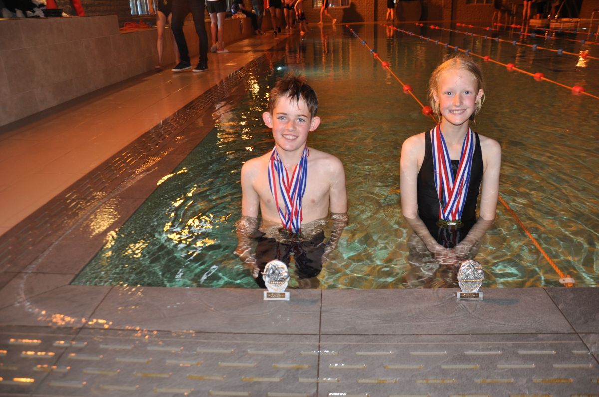 Swimming gala winners Luca Duncan and Eirlys Bowen.