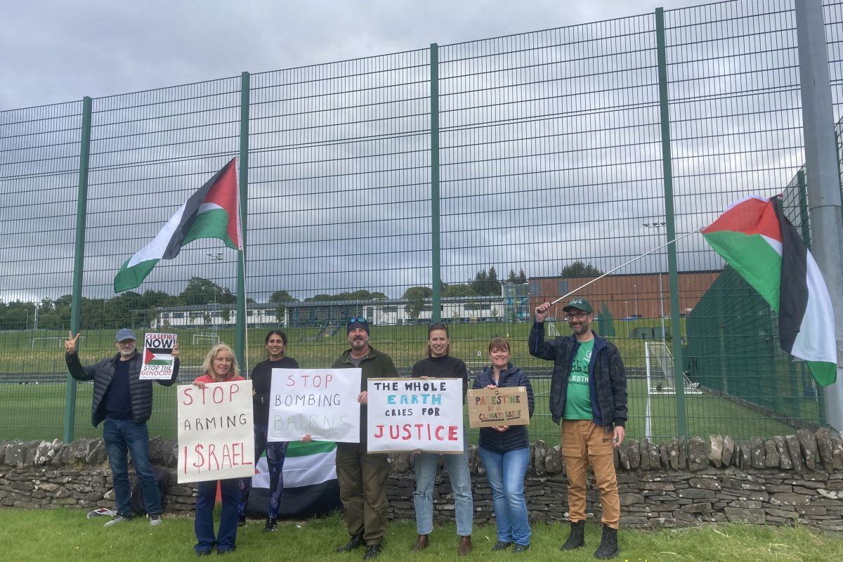 Campaigners protested outside the meeting.