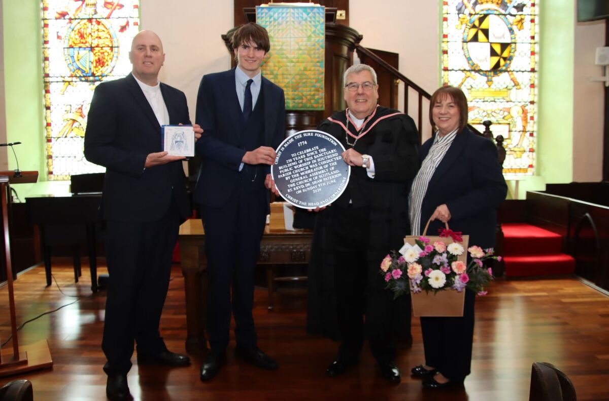 At the 250th anniversary service, from left: Rev Steven Sass, parish minister; parishioner Ruairi Barbour, who presented the plaque for unveiling; Rt Rev Dr Shaw Paterson, Moderator of the Church of Scotland, and his wife Christine. Photograph: Kenny Crai